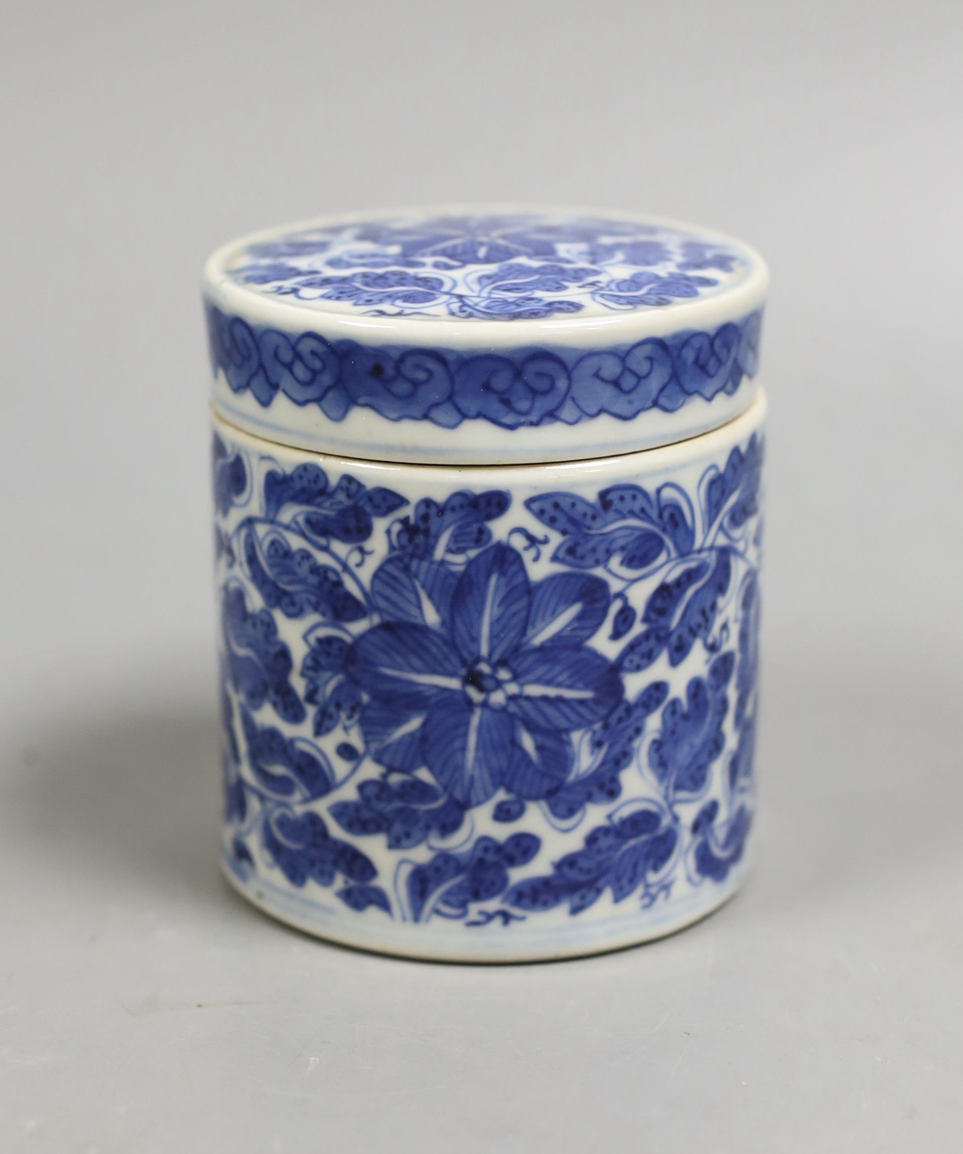 A 19th century Chinese blue and white pot and cover, 9 cms high.